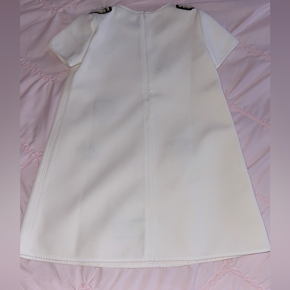 Stylish White Kids Dress with Embellishments - Picture 2 of 3
